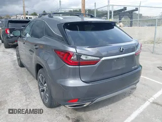 2020 Lexus RX with VIN 2T2HZMAA3LC153100, listed as a IAAI auction lot 41925188 with 104,216 mi miles. Bid and sale history available at carsss.com. Image 3.