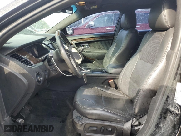 2014 Ford Taurus Limited z VIN 1FAHP2J88EG177883, wystawiony jako Copart lot #56119255 z przebiegiem 141 743 mil mil oraz Szkoda całkowita • Salvage title. Historia ofert i sprzedaży dostępna na DreamBid. Obrazek 7.
