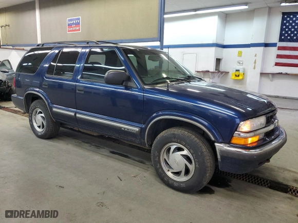 2000 Chevrolet Blazer LT with VIN 1GNDT13W6Y2372092, listed as a Copart auction lot 85784644 with 128,379 mi miles and Salvage Title. Bid and sale history available at carsss.com. Image 4.