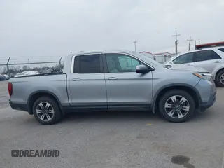 2019 Honda Ridgeline RTL with VIN 5FPYK2F50KB004055, listed as a IAAI auction lot 41576975 with 128,620 mi miles and . Bid and sale history available at DreamBid. Image 13.