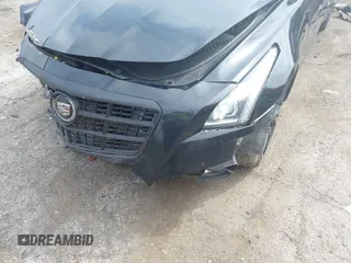 2014 Cadillac CTS Vsport Premium RWD z VIN 1G6AV5S8XE0143389, wystawiony jako IAAI lot #42021009 z przebiegiem 95 102 mil mil oraz . Historia ofert i sprzedaży dostępna na DreamBid. Obrazek 6.