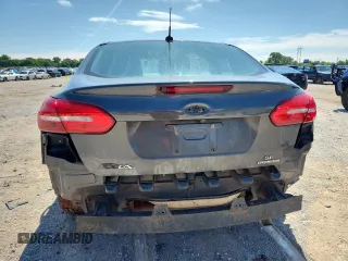 2016 Ford Focus SE with VIN 1FADP3F28GL321967, listed as a Copart auction lot 59556735 with 72,684 mi miles and Salvage title. Bid and sale history available at DreamBid. Image 6.