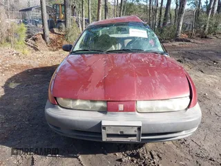 1997 Saturn SL with VIN 1G8ZF528XVZ325466, listed as a IAAI auction lot 41576703 with 237,089 mi miles. Bid and sale history available at carsss.com. Image 12.