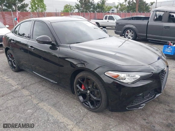 2021 Alfa Romeo Giulia Ti Sport with VIN ZARFAMBN5M7645723, listed as a IAAI auction lot 42057861 with 63,594 mi miles. Bid and sale history available at carsss.com. Image 1.