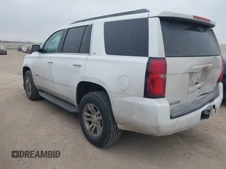 2015 Chevrolet Tahoe LS with VIN 1GNSCAEC2FR641252, listed as a IAAI auction lot 41528667 with 183,796 mi miles and . Bid and sale history available at DreamBid. Image 3.