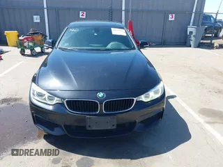 2015 BMW 4 Series 428i z VIN WBA4A9C52FGL86332, wystawiony jako IAAI lot #41970189 z przebiegiem 112 282 mil mil oraz . Historia ofert i sprzedaży dostępna na DreamBid. Obrazek 13.