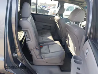 2013 Honda Pilot Touring with VIN 5FNYF4H94DB035692, listed as a IAAI auction lot 41771116 with 137,464 mi miles and . Bid and sale history available at carsss.com. Image 8.
