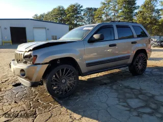 2005 Jeep Grand Cherokee Laredo with VIN 1J4HS48N65C732587, listed as a Copart auction lot 80656084 with 214,037 mi miles and Salvage Title. Bid and sale history available at carsss.com. Image 1.