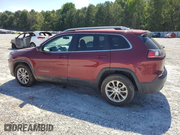 2019 Jeep Cherokee Latitude with VIN 1C4PJLCB7KD205885, listed as a Copart auction lot 58077555 with 188,034 mi miles and Salvage title. Bid and sale history available at DreamBid. Image 2.