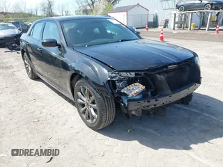2014 Chrysler 300 with VIN 2C3CCAGG4EH286844, listed as a IAAI auction lot 42043221 with 120,986 mi miles. Bid and sale history available at carsss.com. Image 1.