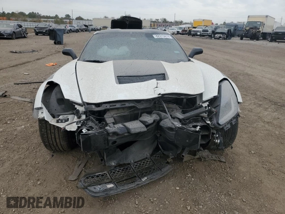 2014 Chevrolet Corvette Z51 1LT z VIN 1G1YH2D77E5102297, wystawiony jako Copart lot #82313414 z przebiegiem 44 124 mil mil oraz Szkoda całkowita • Salvage title. Historia ofert i sprzedaży dostępna na DreamBid. Obrazek 5.