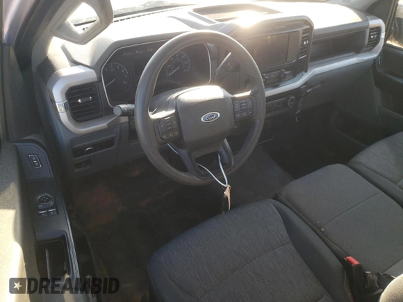 2023 Ford F-150 XL with VIN 1FTMF1CB0PKF28526, listed as a Copart auction lot 87726585 with 51,869 mi miles and Salvage Title. Bid and sale history available at carsss.com. Image 8.