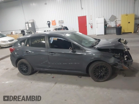 2018 Subaru Impreza with VIN 4S3GTAA65J3713216, listed as a IAAI auction lot 40963294 with 94,176 mi miles and . Bid and sale history available at DreamBid. Image 13.