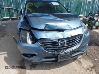 2014 Mazda CX-9 Touring with VIN JM3TB3CV7E0440747, listed as a IAAI auction lot 42457709 with 166,588 mi miles and . Bid and sale history available at DreamBid. Image 6.