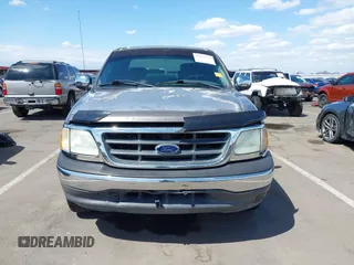 2002 Ford F-150 XLT with VIN 1FTRW07L22KB41794, listed as a IAAI auction lot 42072478 with 116,252 mi miles and . Bid and sale history available at DreamBid. Image 12.