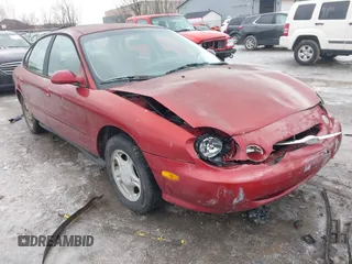 1998 Ford Taurus LX z VIN 1FAFP52U3WA275468, wystawiony jako IAAI lot #41578417 z przebiegiem 147 281 mil mil oraz . Historia ofert i sprzedaży dostępna na DreamBid. Obrazek 1.