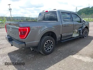 2021 Ford F-150 XL with VIN 1FTFW1E56MKE74015, listed as a IAAI auction lot 42172934 with 27,186 mi miles and . Bid and sale history available at DreamBid. Image 4.