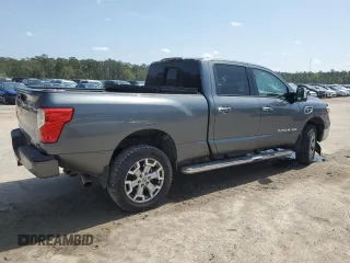 2017 Nissan Titan SL z VIN 1N6BA1F49HN514463, wystawiony jako Copart lot #51046805 z przebiegiem 99 686 mil mil oraz Szkody całkowita. Historia ofert i sprzedaży dostępna na DreamBid. Obrazek 3.