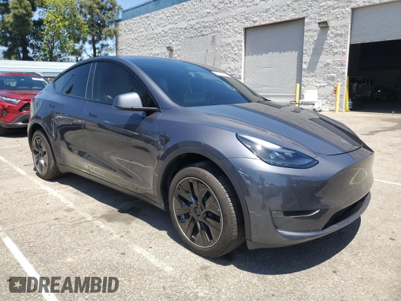 2024 Tesla Model Y Long Range with VIN 7SAYGDEEXRA215975, listed as a Copart auction lot 56705585 with 20,554 mi miles and Salvage Title. Bid and sale history available at DreamBid. Image 4.