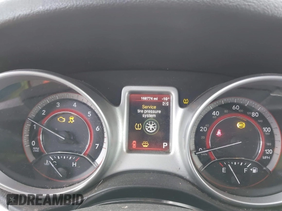 2014 Dodge Journey American Value with VIN 3C4PDCAB1ET209973, listed as a IAAI auction lot 41803864 with 168,774 mi miles and . Bid and sale history available at DreamBid. Image 7.