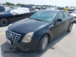 2013 Cadillac CTS Luxury with VIN 1G6DE5E50D0101763, listed as a IAAI auction lot 42090577 with 105,097 mi miles and . Bid and sale history available at DreamBid. Image 2.