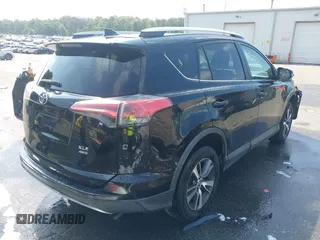 2016 Toyota RAV4 XLE with VIN 2T3RFREV9GW458057, listed as a IAAI auction lot 42651373 with 119,750 mi miles and . Bid and sale history available at DreamBid. Image 4.
