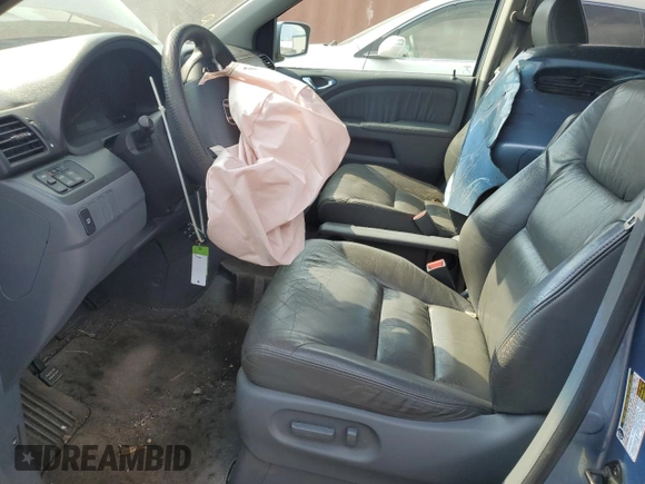 2005 Honda Odyssey EX-L z VIN 5FNRL38685B092279, wystawiony jako Copart lot #57452175 z przebiegiem Nie podano mil oraz Szkoda całkowita • Salvage title. Historia ofert i sprzedaży dostępna na DreamBid. Obrazek 7.