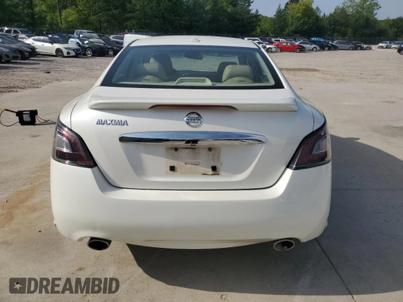 2014 Nissan Maxima SV z VIN 1N4AA5AP4EC446058, wystawiony jako Copart lot #51843385 z przebiegiem 98 481 mil mil oraz Szkoda całkowita • Salvage title. Historia ofert i sprzedaży dostępna na DreamBid. Obrazek 6.
