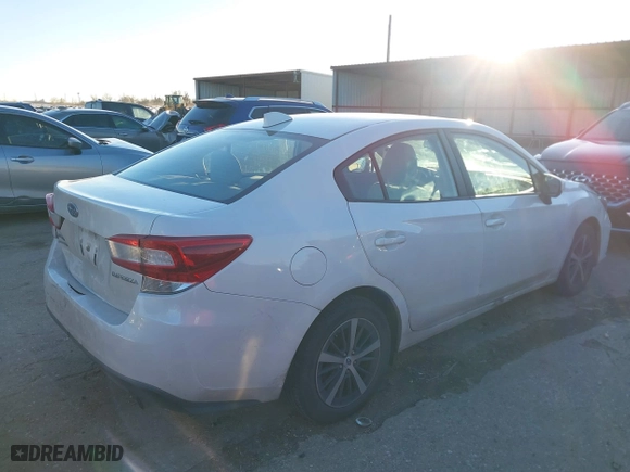 2019 Subaru Impreza Premium with VIN 4S3GKAD66K3623489, listed as a IAAI auction lot 41236407 with 87,907 mi miles. Bid and sale history available at carsss.com. Image 4.