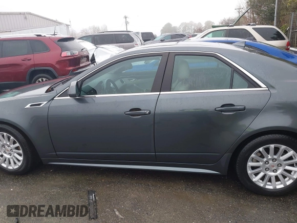 2012 Cadillac CTS with VIN 1G6DA5E56C0143588, listed as a IAAI auction lot 41416131 with 230,310 mi miles and . Bid and sale history available at DreamBid. Image 14.