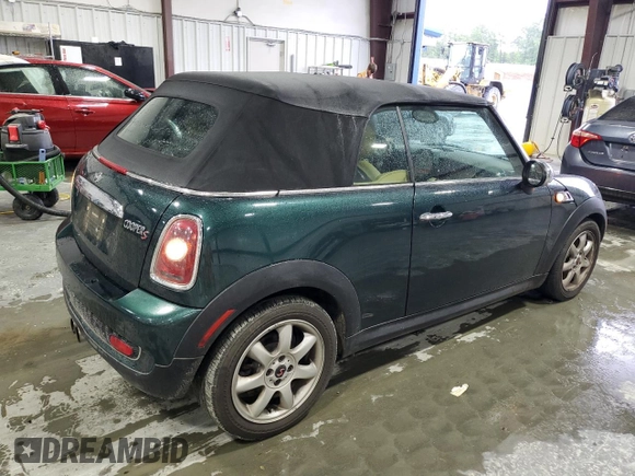 2010 MINI Convertible S with VIN WMWMS3C54ATY51980, listed as a Copart auction lot 56589265 with 147,136 mi miles and Salvage title. Bid and sale history available at DreamBid. Image 3.