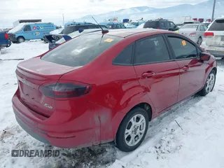 2016 Ford Fiesta SE with VIN 3FADP4BJ9GM159803, listed as a IAAI auction lot 41629525 with 1 mi miles. Bid and sale history available at carsss.com. Image 4.