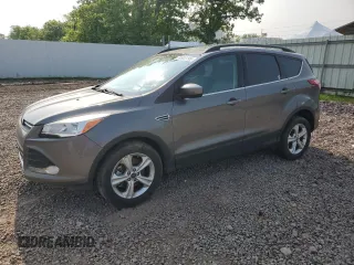 2014 Ford Escape SE z VIN 1FMCU9G99EUA90979, wystawiony jako Copart lot #58992195 z przebiegiem 183 068 mil mil oraz Szkoda całkowita • Salvage title. Historia ofert i sprzedaży dostępna na DreamBid. Obrazek 1.