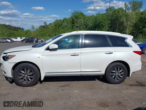 2015 Infiniti QX60 with VIN 5N1AL0MM1FC524964, listed as a IAAI auction lot 42010993 with 144,670 mi miles and . Bid and sale history available at DreamBid. Image 14.
