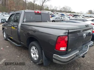 2015 Ram 1500 SLT z VIN 1C6RR6GG9FS512153, wystawiony jako IAAI lot #41475083 z przebiegiem 64 338 mil mil oraz . Historia ofert i sprzedaży dostępna na DreamBid. Obrazek 3.
