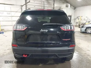 2022 Jeep Cherokee Trailhawk with VIN 1C4PJMBX8ND517236, listed as a IAAI auction lot 41530369 with 34,164 mi miles and . Bid and sale history available at DreamBid. Image 16.