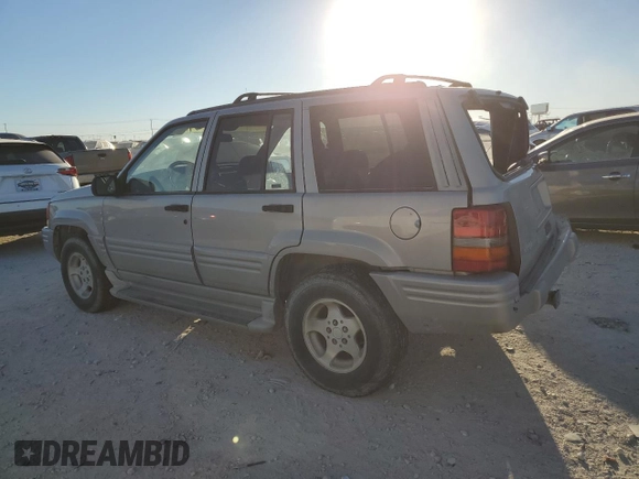 1998 Jeep Grand Cherokee with VIN 1J4FX48S4WC345469, listed as a Copart auction lot 80721224 with 201,543 mi miles and Salvage title. Bid and sale history available at DreamBid. Image 2.