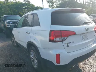 2014 Kia Sorento EX with VIN 5XYKU4A70EG431214, listed as a IAAI auction lot 42231124 with 99,275 mi miles and . Bid and sale history available at DreamBid. Image 3.