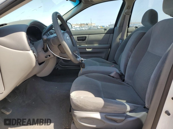 2006 Ford Taurus SE with VIN 1FAFP53UX6A194398, listed as a Copart auction lot 59582515 with 114,933 mi miles and Salvage title. Bid and sale history available at DreamBid. Image 7.