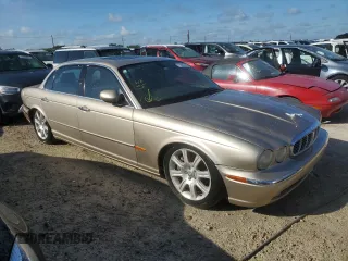 2005 Jaguar XJ with VIN SAJWA79C05SG46913, listed as a Copart auction lot 75092794 with 0 mi miles and Salvage Title. Bid and sale history available at carsss.com. Image 4.