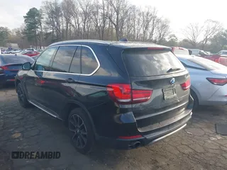 2014 BMW X5 sDrive35i with VIN 5UXKR2C50E0H31926, listed as a IAAI auction lot 41838021 with 125,813 mi miles. Bid and sale history available at carsss.com. Image 3.