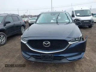 2020 Mazda CX-5 Touring with VIN JM3KFBCM9L0799502, listed as a IAAI auction lot 42007207 with 43,364 mi miles. Bid and sale history available at carsss.com. Image 11.