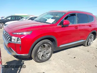2022 Hyundai Santa Fe SEL with VIN 5NMS24AJ8NH415477, listed as a IAAI auction lot 41877486 with 20,553 mi miles and . Bid and sale history available at DreamBid. Image 2.