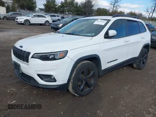 2020 Jeep Cherokee Altitude with VIN 1C4PJMLX0LD621828, listed as a IAAI auction lot 41439862 with 74,350 mi miles and . Bid and sale history available at DreamBid. Image 2.