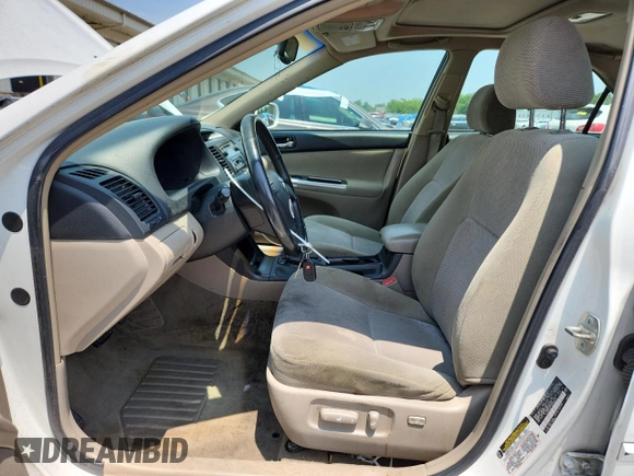 2005 Toyota Camry STD с VIN 4T1BE32K75U626098, выставлен на аукционе Copart как лот 55910145 с пробегом 227 015 миль миль и Списание • Salvage title. История ставок и продаж доступна на DreamBid. Изображение 7.