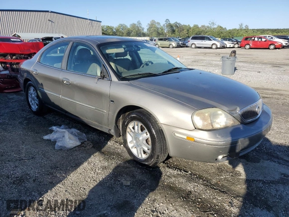 2004 Mercury Sable LS Premium with VIN 1MEHM55S84A614002, listed as a Copart auction lot 56582965 with 185,589 mi miles and Salvage title. Bid and sale history available at DreamBid. Image 4.