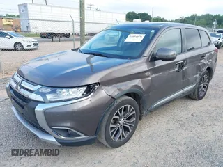 2016 Mitsubishi Outlander SE with VIN JA4AD3A38GZ048297, listed as a IAAI auction lot 42634676 with 223,715 mi miles and . Bid and sale history available at DreamBid. Image 2.