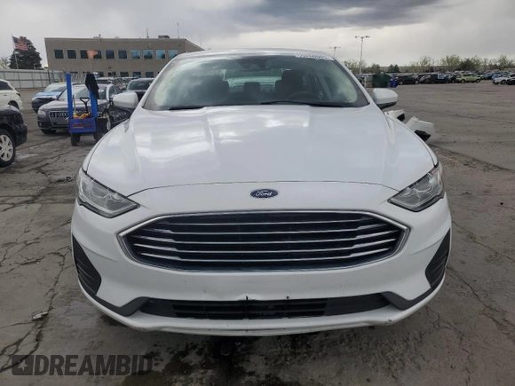 2020 Ford Fusion SE z VIN 3FA6P0T9XLR138977, wystawiony jako Copart lot #55260085 z przebiegiem 92 470 mil mil oraz Szkoda całkowita • Salvage title. Historia ofert i sprzedaży dostępna na DreamBid. Obrazek 5.