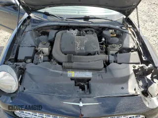 2002 Ford Thunderbird Hardtop Premium z VIN 1FAHP60A92Y117614, wystawiony jako Copart lot #59344735 z przebiegiem 83 723 mil mil oraz Szkoda całkowita • Salvage title. Historia ofert i sprzedaży dostępna na DreamBid. Obrazek 11.