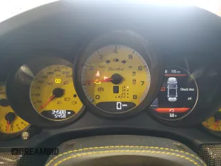 2015 Porsche 911 Turbo z VIN WP0CD2A91FS178328, wystawiony jako Copart lot #57880135 z przebiegiem 34 588 mil mil oraz Szkoda całkowita • Salvage title. Historia ofert i sprzedaży dostępna na DreamBid. Obrazek 9.